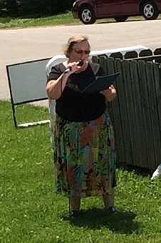 Betty Martin speaking to the crowd at the 15th Anniversary Open House at L.I.F.E. House For Animals in Frankfort, KY on May 20, 2018