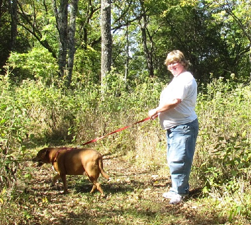 Molly and Barbara walking a trail through the woods at Fort Hill, Frankfort, KY